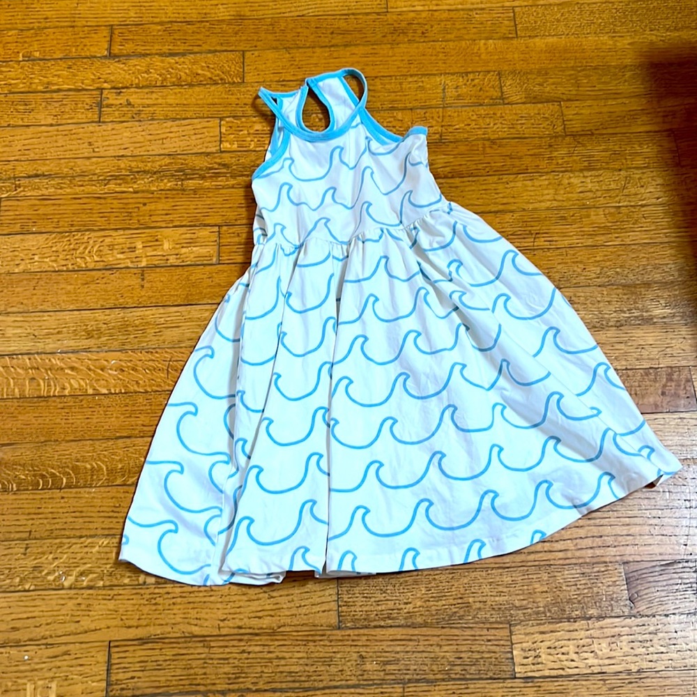 This is a Monica and Andy dress. It is White and Blue with waves on it.